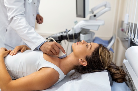 doctor-making-ultrasound-thyroid-gland-woman-patient-clinic-diagnosis-treatment-autoimmune-thyroiditis-concept